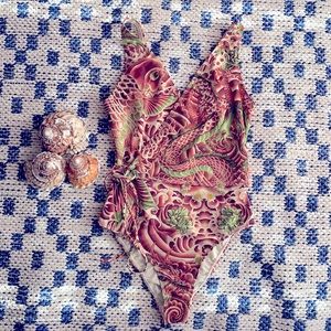 Ornate one piece tied bathing suit